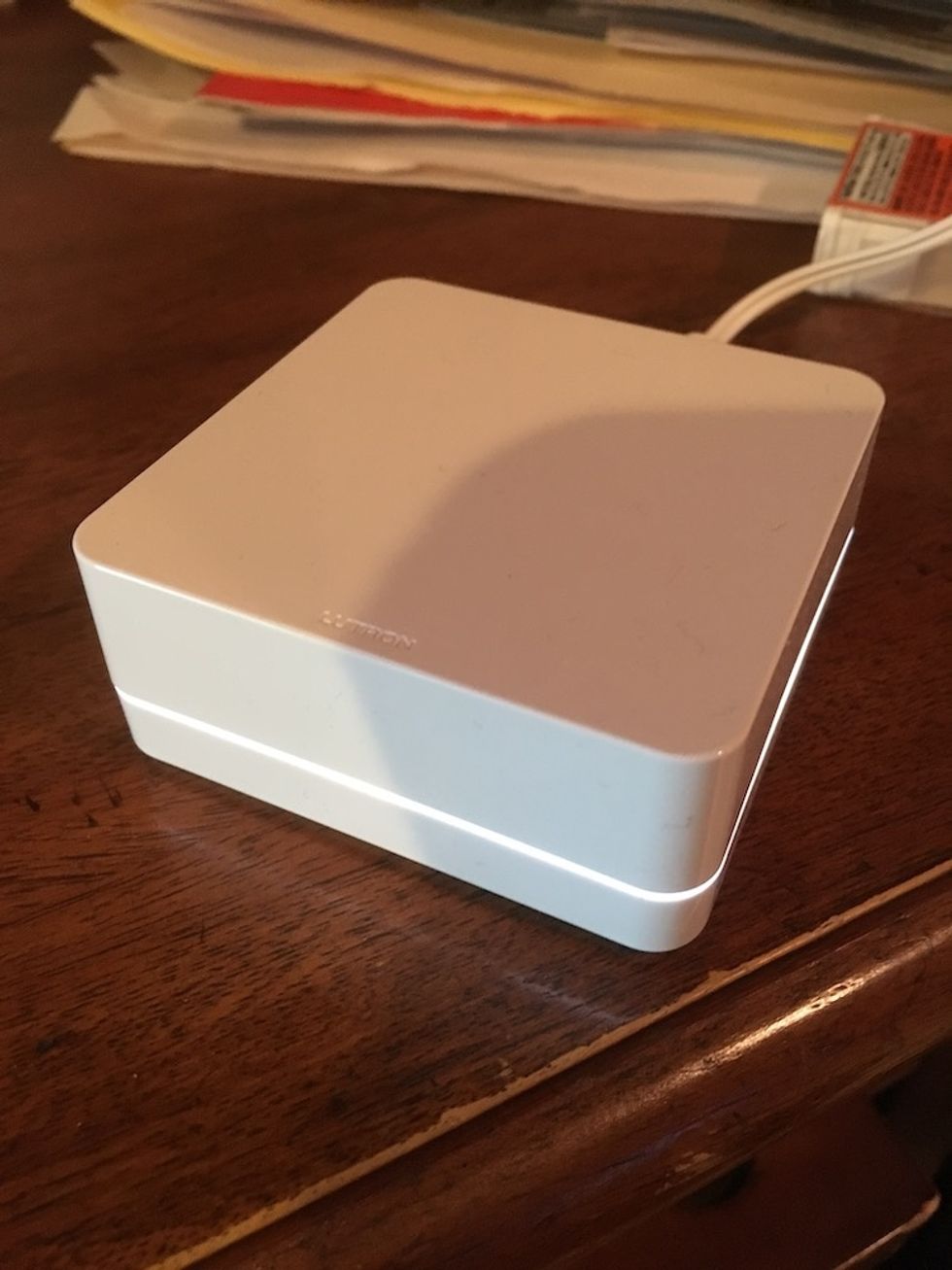 Photo of Lutron Caseta Smart Bridge hub connected.
