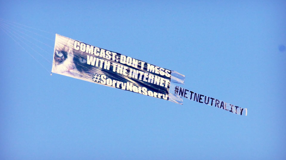 Grumpy Cat Celebrates Net Neutrality Win With a Quick Jaunt Over Comcast HQ