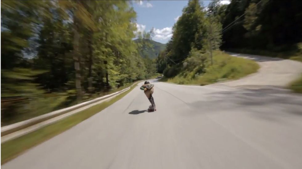 Watch Skateboarders Hit 70 MPH In Wild Downhill Race
