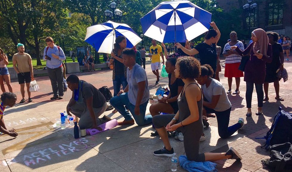 University Of Michigan Student Kneels For 20 Hours Straight To Protest Injustice On Campus