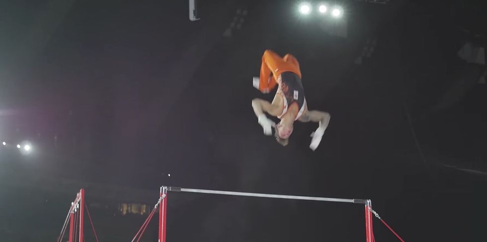 A Gymnast Gave The Crowd A Scare After Falling From The High Bar During His Routine