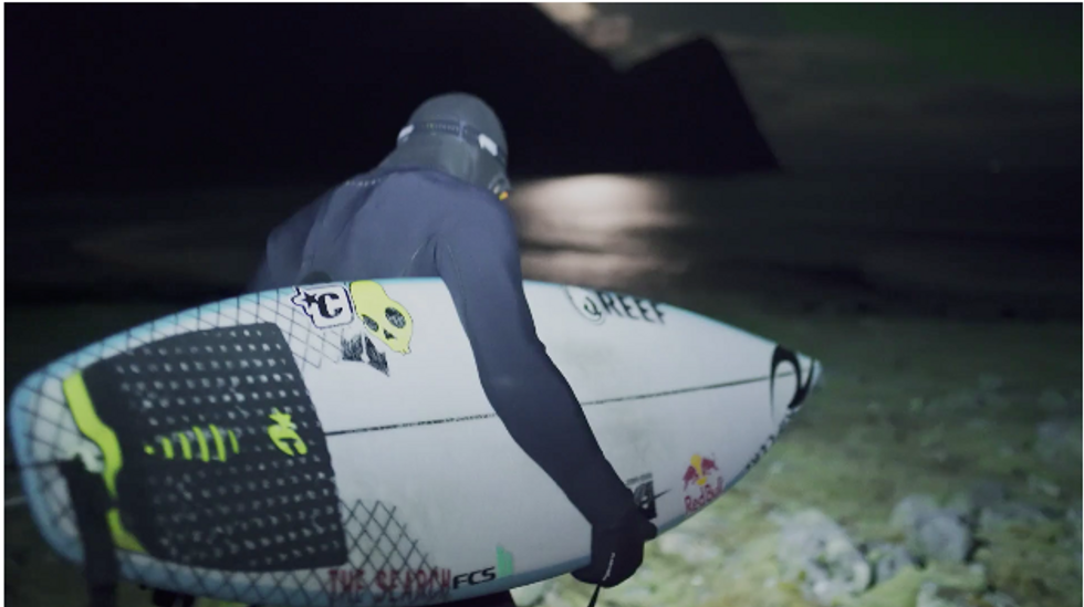 Surfing Under The Northern Lights Is As Beautiful As It Sounds