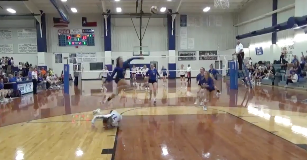 A High School Volleyball Player Makes A Superhuman Leap To Save The Play And The Point