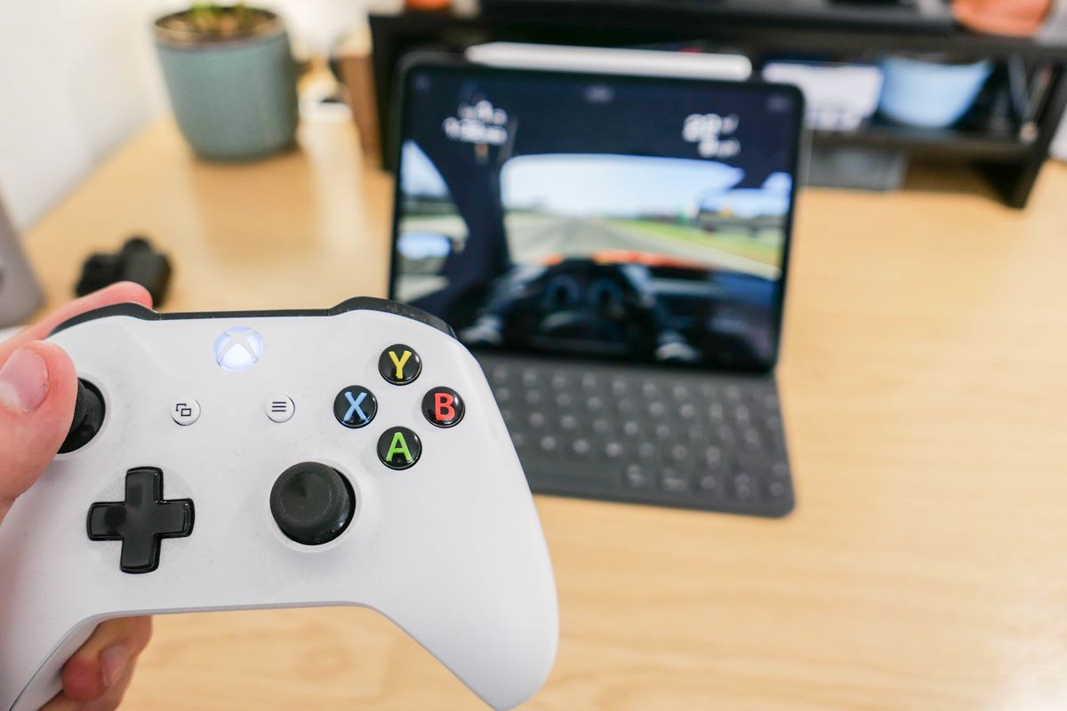 Photo of an Xbox One controller and iPad Pro