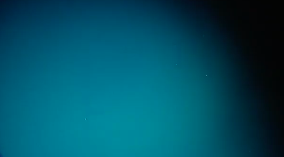 Blueish-green water with little else visible in the camera