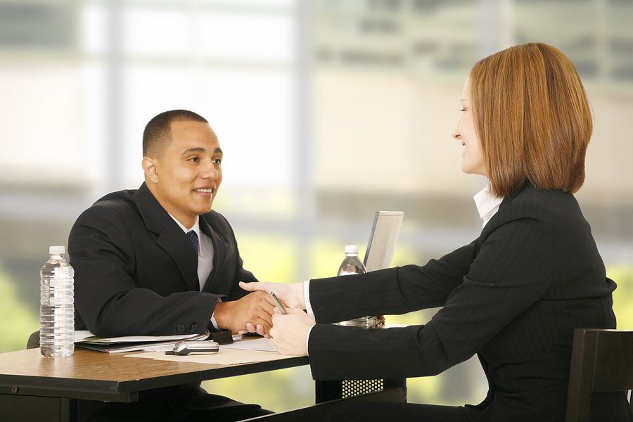 Two professionals conducting an informational interview