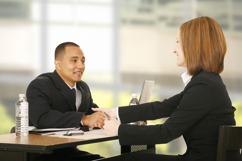 Two professionals conducting an informational interview