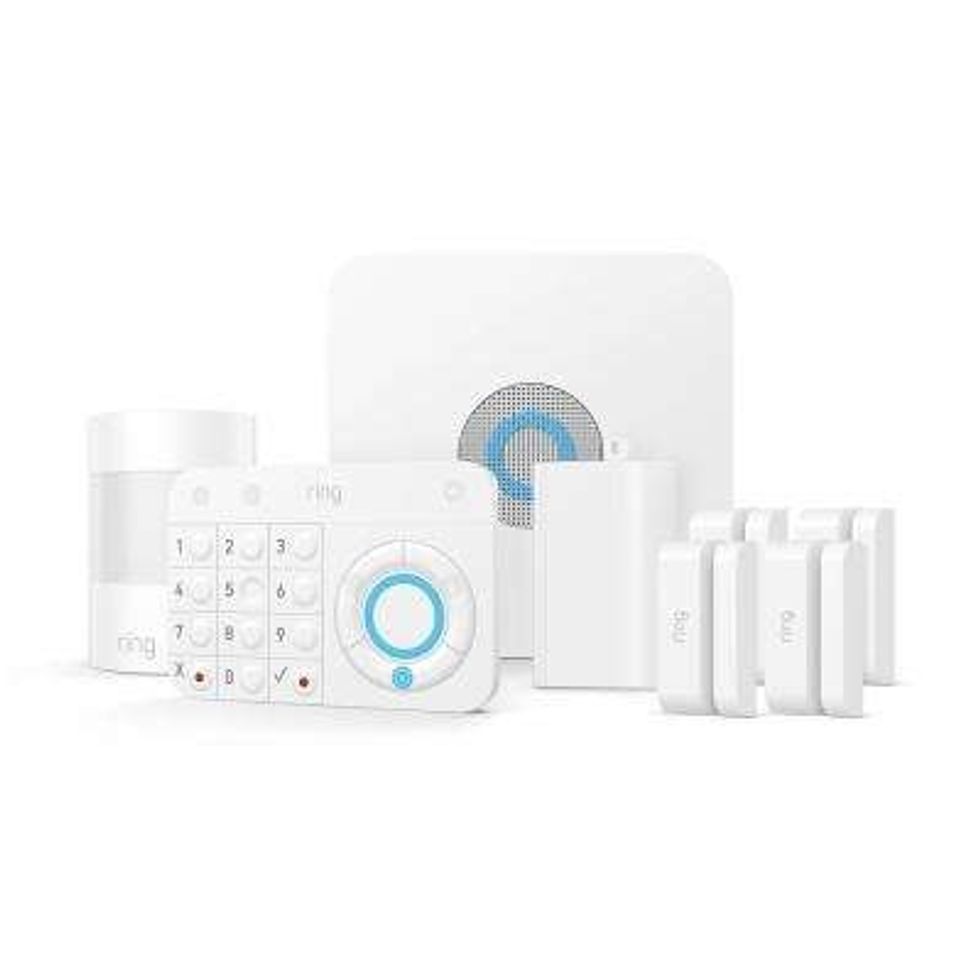 A series of Ring Alarm products, white plastic devices with numbers and wheels