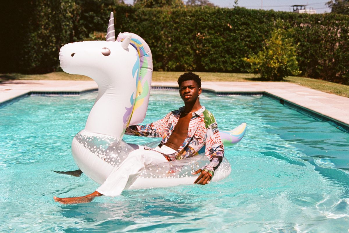 Lil Nas X on a Unicorn Floatie