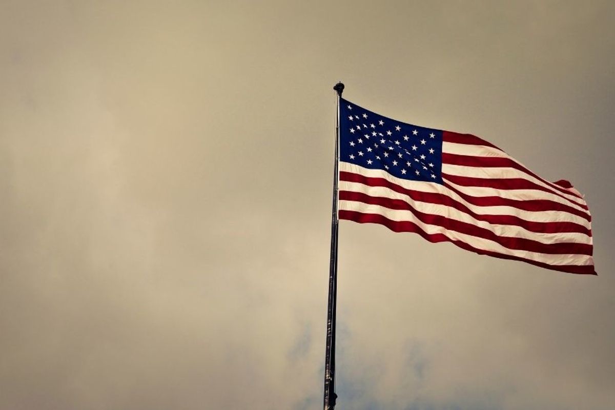 Hey, America—Is it less patriotic to kneel or to beat up a child during the national anthem?