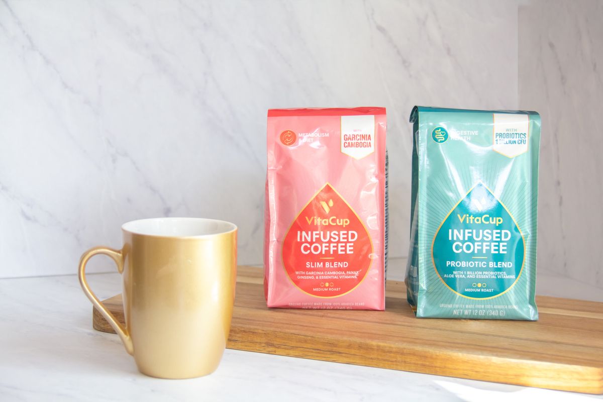2 contains of Vitacup coffee with mugs and vitamins