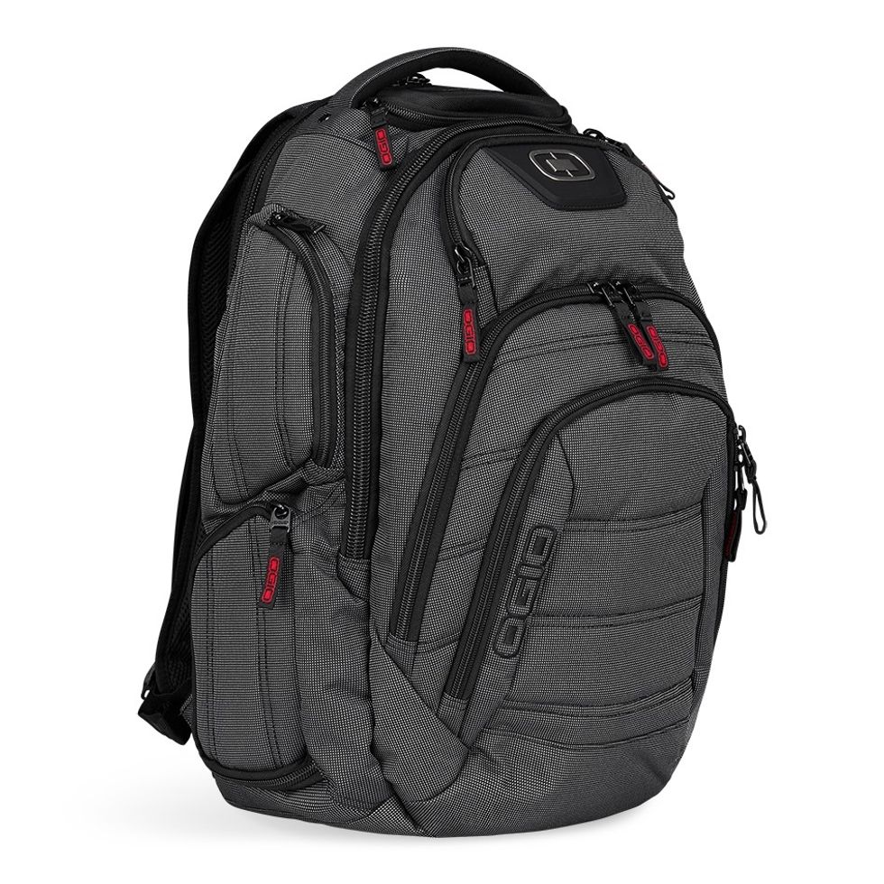 A gray and black backpack with red zipper tabs and the word "Ogio" stitched on the back panel