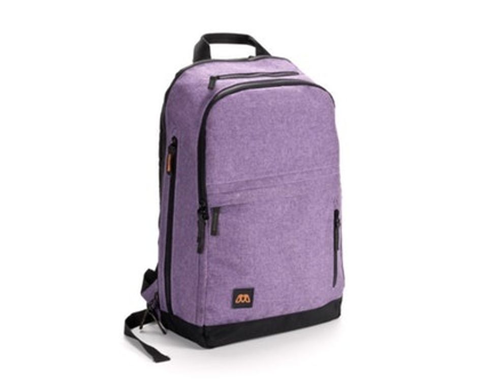 A pink backpack with black trim along the zippers and handles