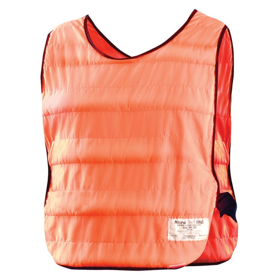 An orange sleeveless vest with horizontal stitching and black piping at the neck