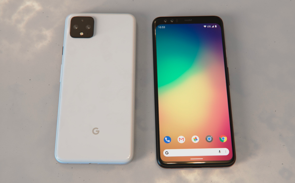 Two Google phones on a table, side by side, one on its front and one on its back