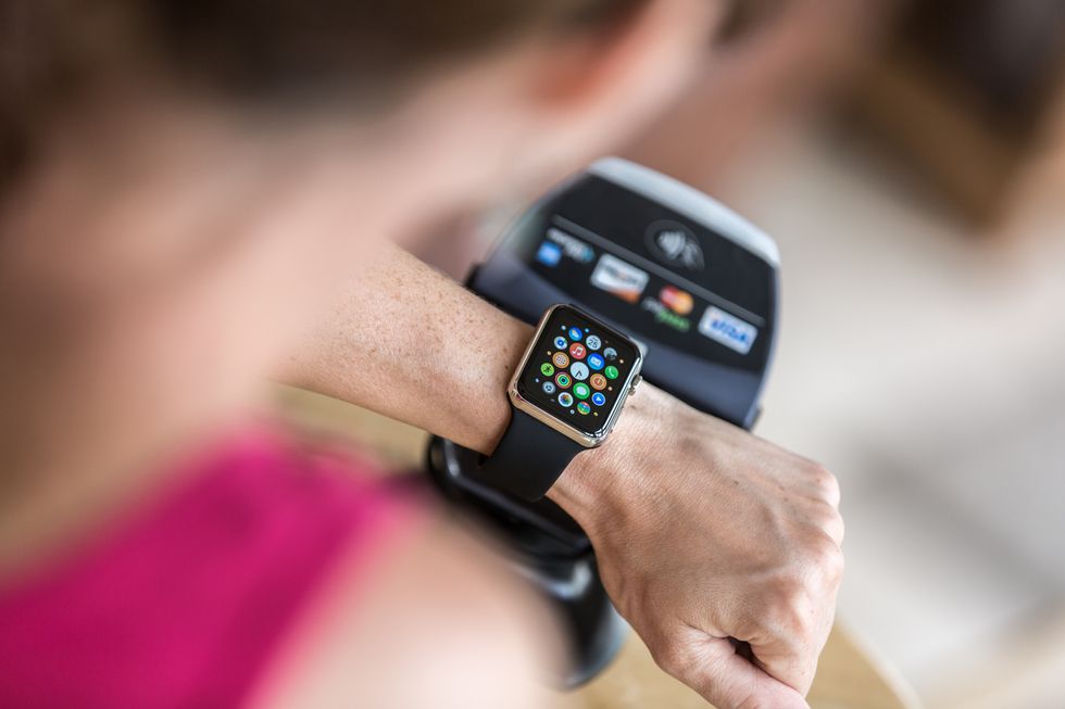 Photo of a payment being made with an Apple Watch
