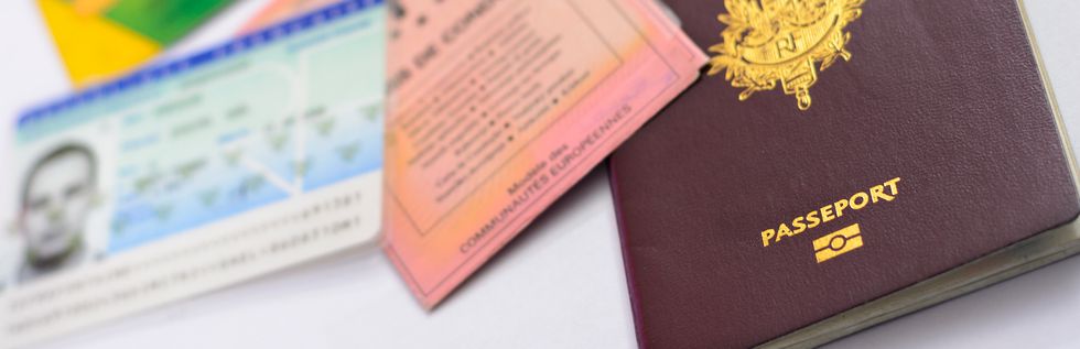 Stock image of ID cards and a passport