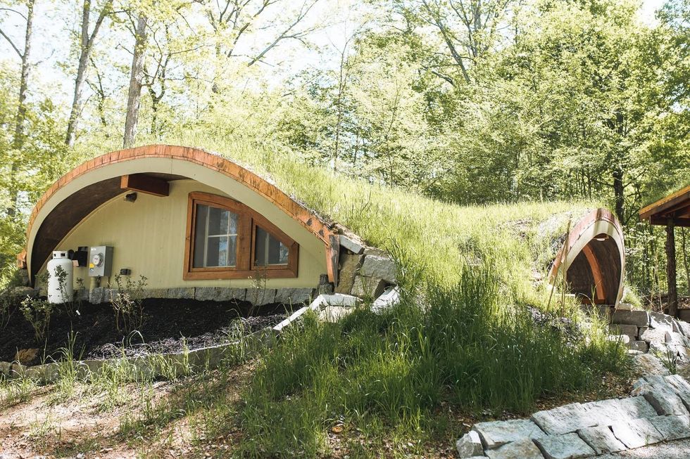 You can stay in this hobbit hole tiny house tucked away in the
