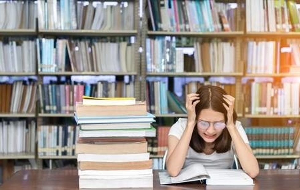 https://us.123rf.com/450wm/champlifezy/champlifezy1707/champlifezy170700093/83007181-young-girl-student-with-glasses-reading-book-overlap-serious-hard-exam-quiz-test-sleeping-headache-w.jpg?ver=6