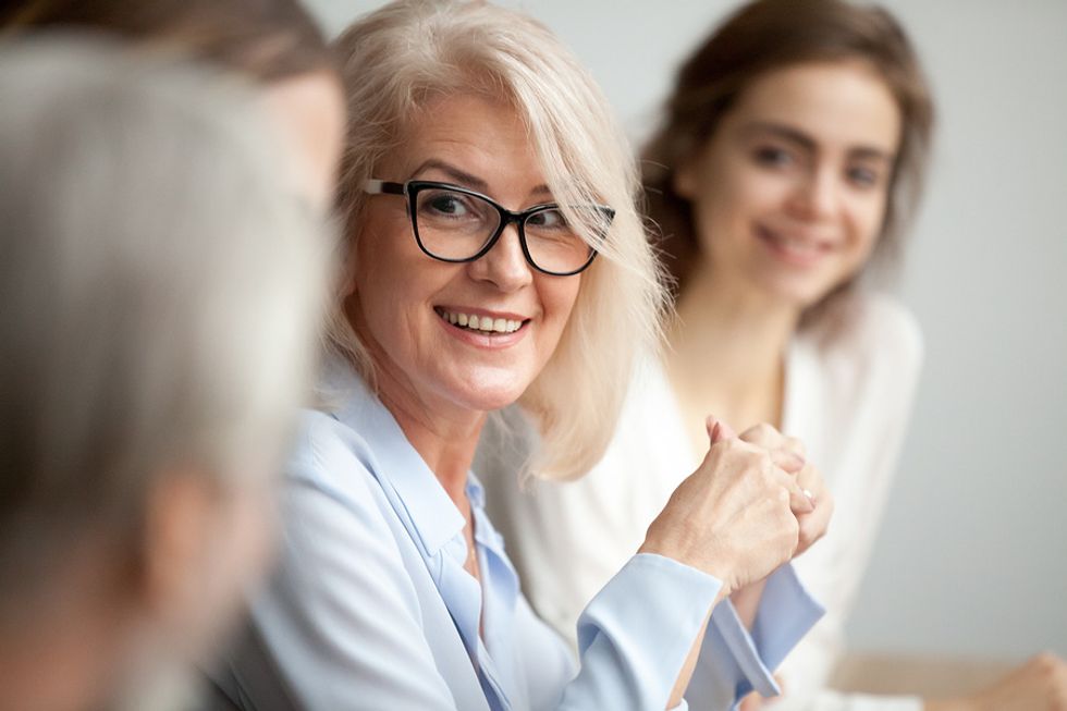 Female boss displaying her leadership skills at the office.