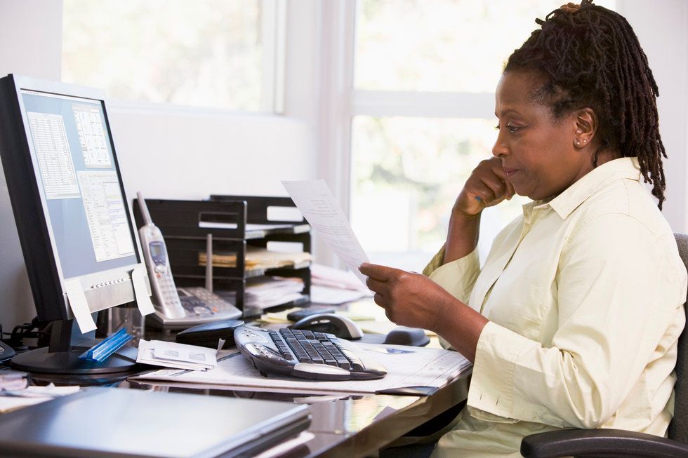 Hiring manager looking over resume explaining job gap