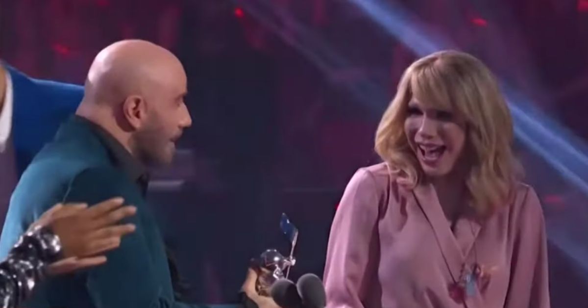 John Travolta Seemingly Mistakes Drag Queen For Taylor Swift During Awkward VMAs Moment