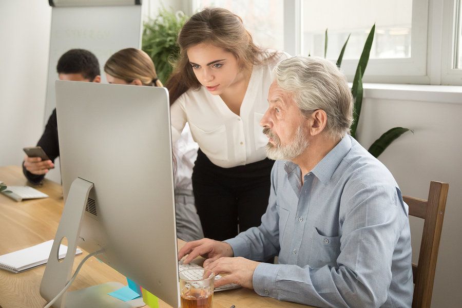 Manager clearly communicating with her employee in the office.