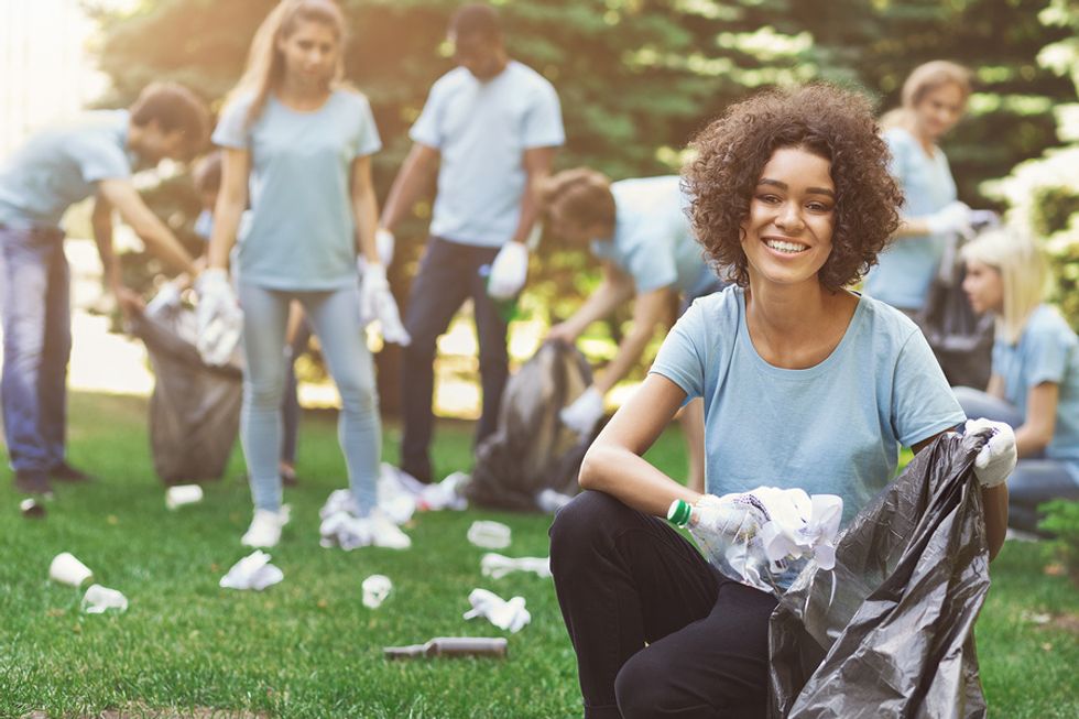 Young woman volunteers to keep busy during a career gap.