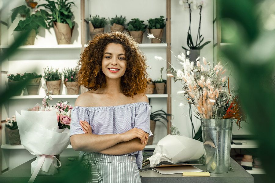 Young woman works a part-time job while seeking a full-time position.