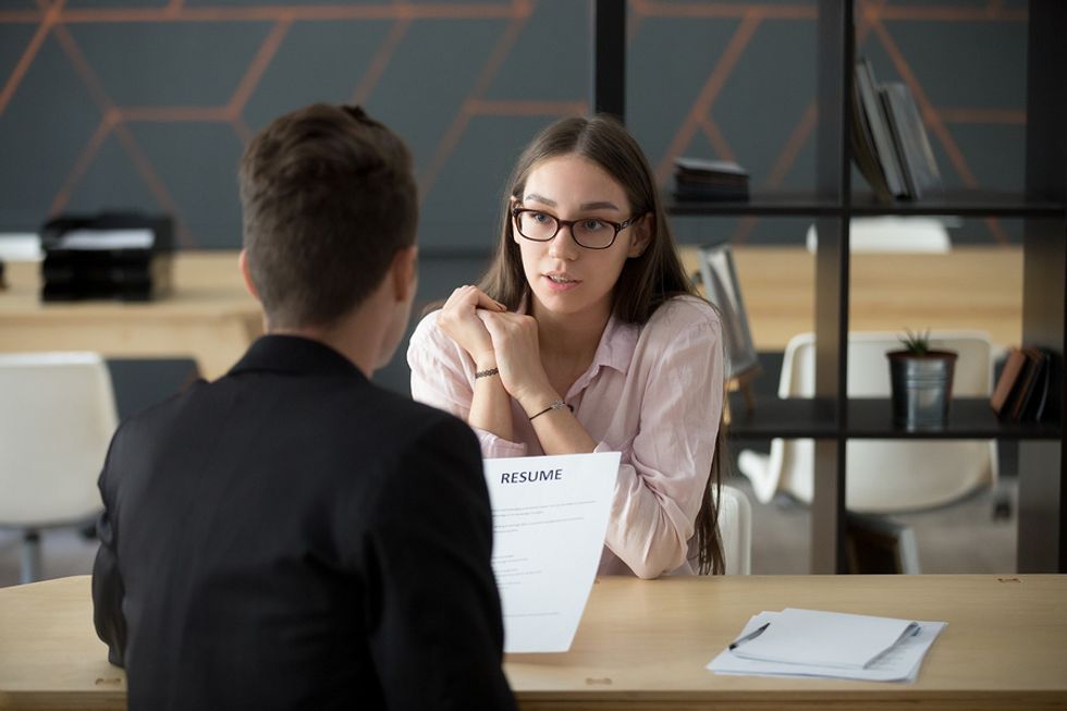 Job candidate answers a behavioral interview question with the STAR technique