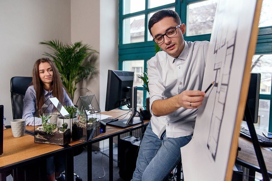 Man showing he's ready to take on more responsibility at work by leading a tough project.