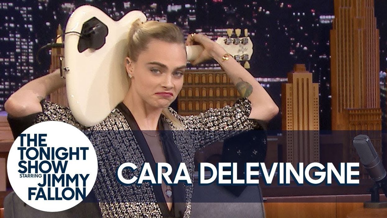 Watch actress Cara Delevingne play 'Sweet Home Alabama' on guitar behind her head