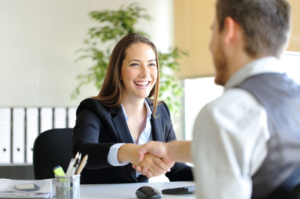Professional woman successfully conveys her personal brand in a job interview