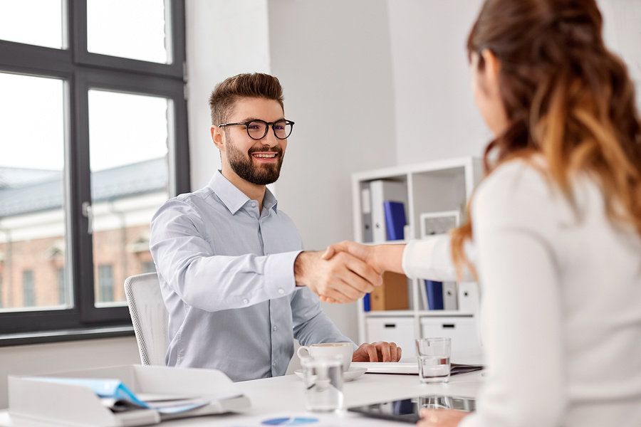 Man getting offered a job after he joined Work It Daily's career growth club and took its career advice and utilized its job search strategy.