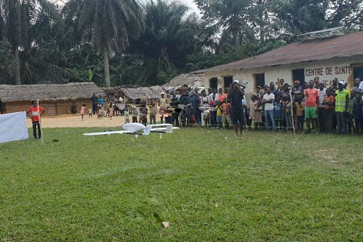 Villagers rejoice as they receive the first vaccines ever delivered via drone in the Congo