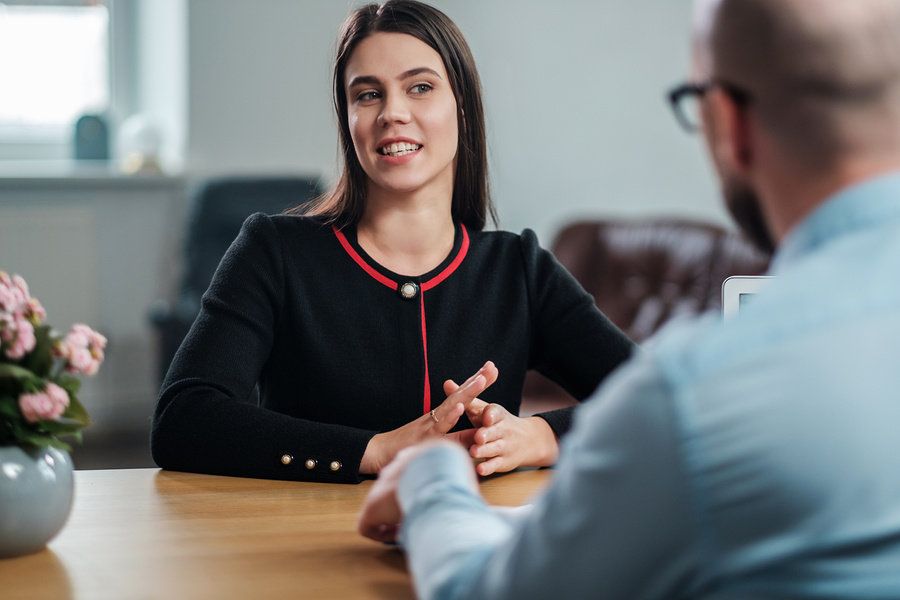 Job candidate answers the question, "Why should we hire you?" during an interview