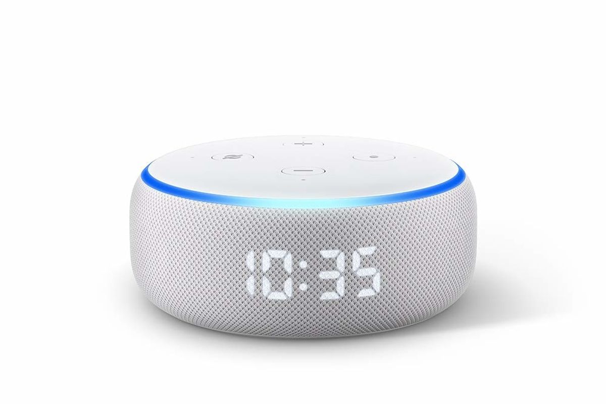 An Echo Dot with an LED time clock on it