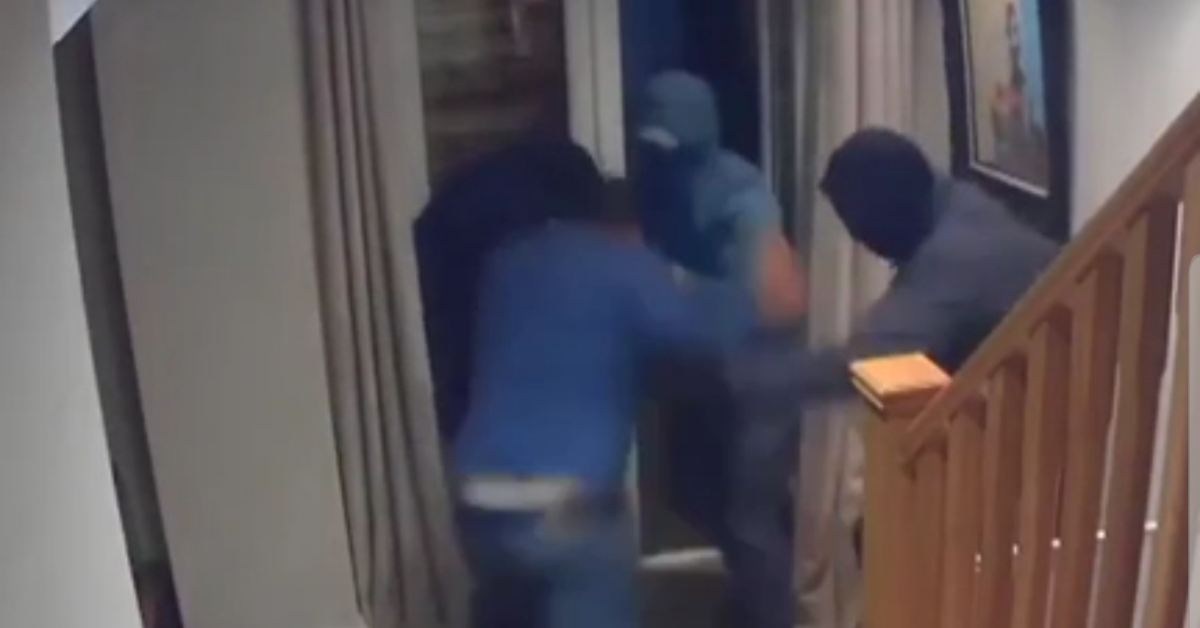 Businessman Fights Off Four Armed Robbers With His Bare Hands In Surreal Security Video