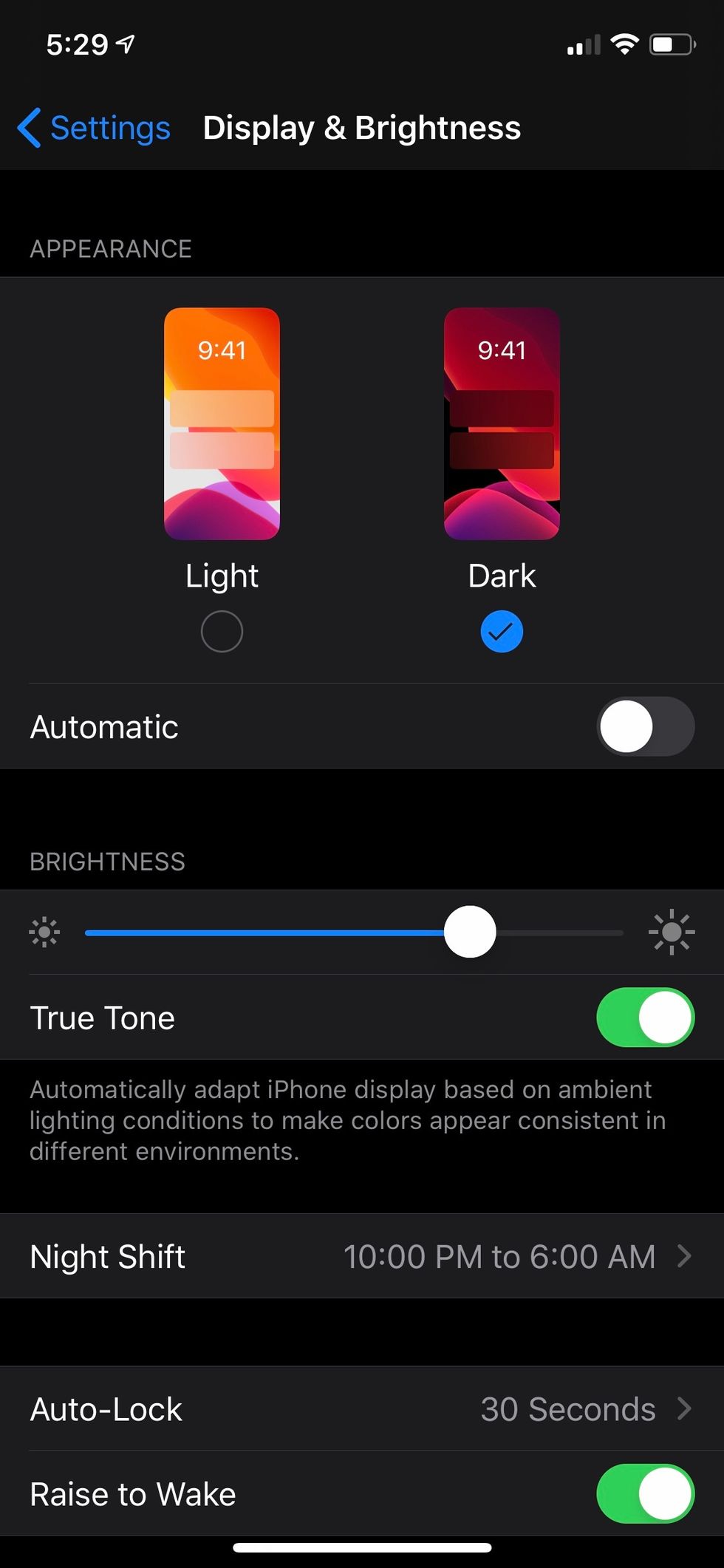 An iPhone showing Dark Mode in iOS 13