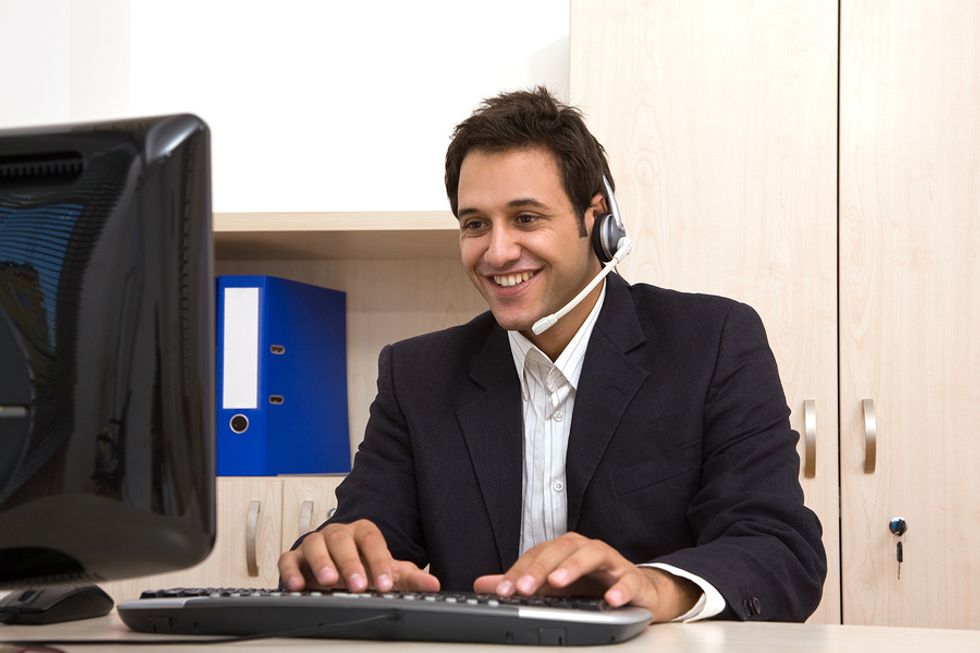 A stay-at-home father works a flex job as a customer service representative.