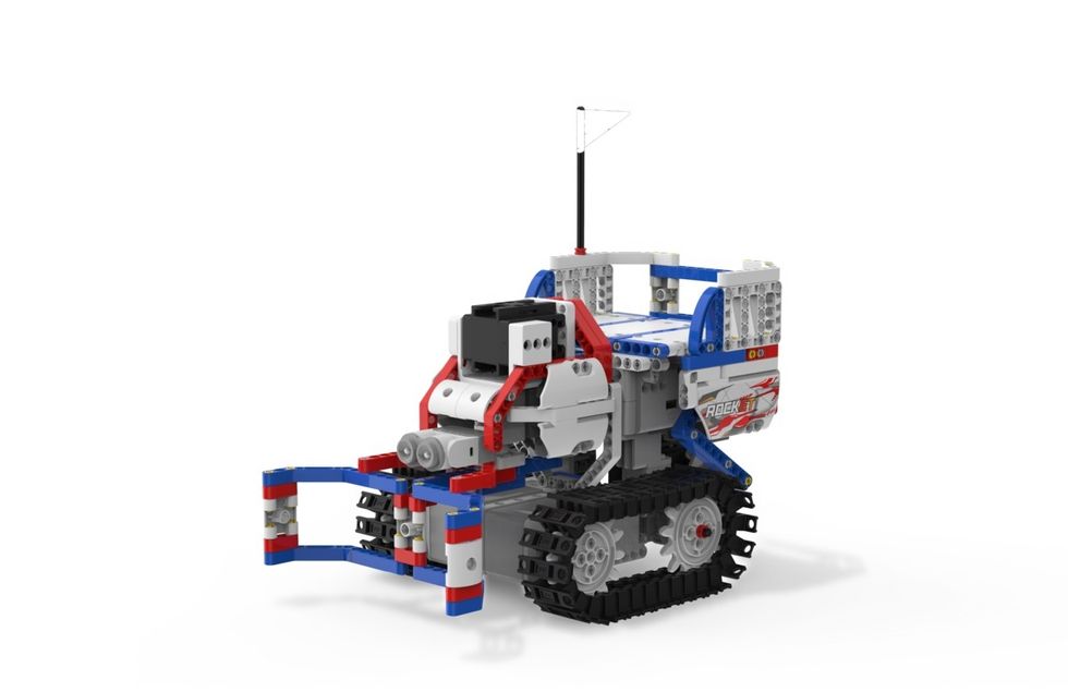 The UBTECH Jimu ChampBot, a rolling toy robot with red, blue, white and gray blocks, and wheels