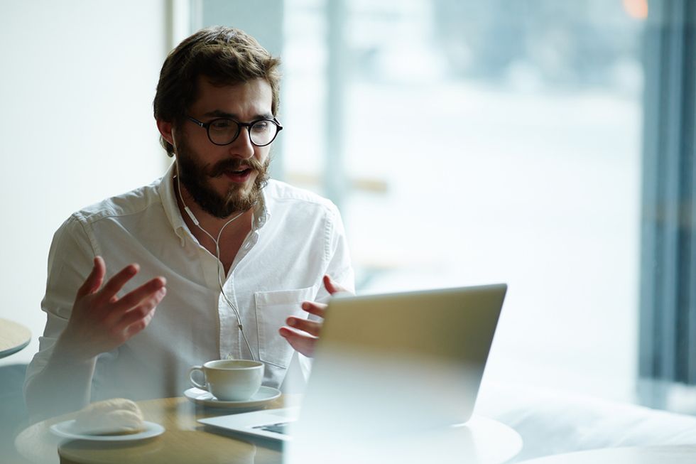 Job seeker practicing for his Skype interview