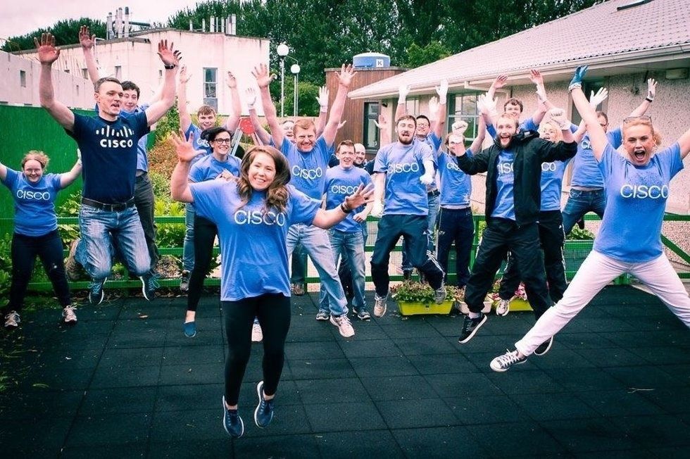 Happy Cisco Employees Enjoying Their Work's Great Company Culture!
