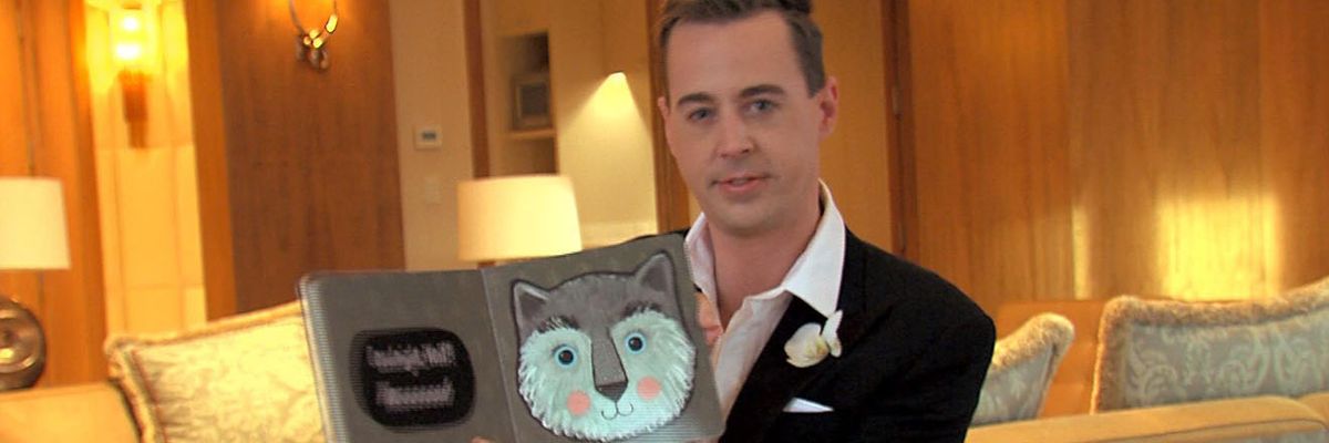 NCIS star Sean Murray holds a copy of Goodnight Bear as he reads a bedtime story.