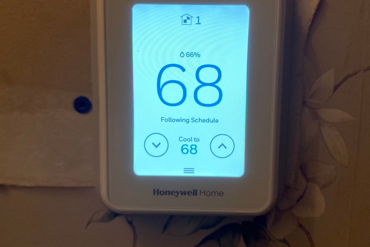 Photo of Honeywell Home T9 Smart Thermostat on a wall.
