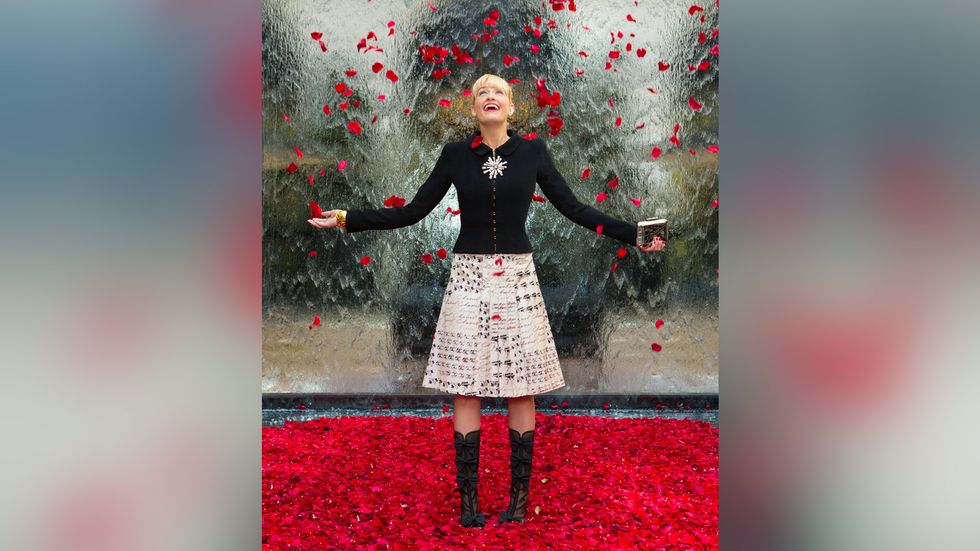 Beth Behrs with rose petals