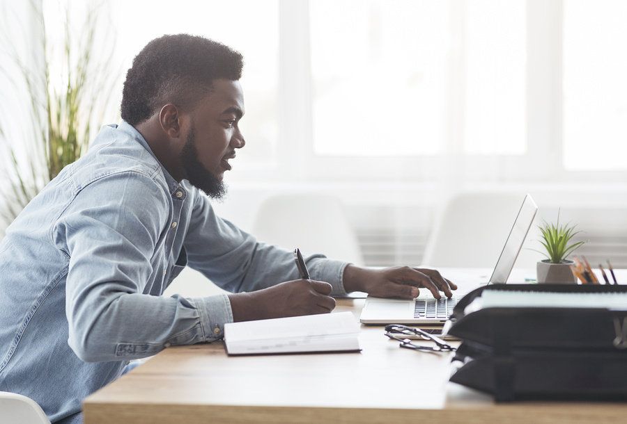 Professional man doing a gap analysis for his career development plan