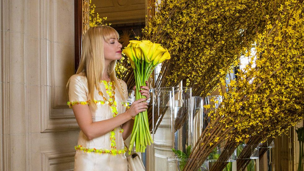 Beth Behrs stops to smell flowers