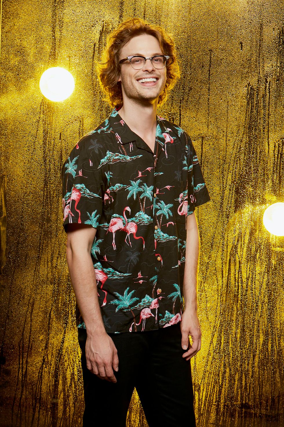 Matthew Gray Gubler of Criminal Minds in wild print shirt