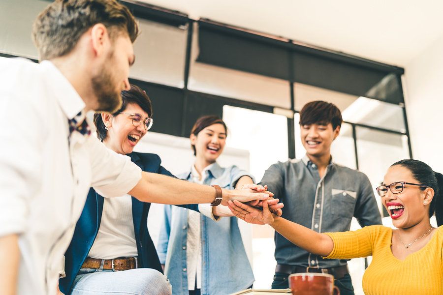 Co-workers connecting and working together as a team